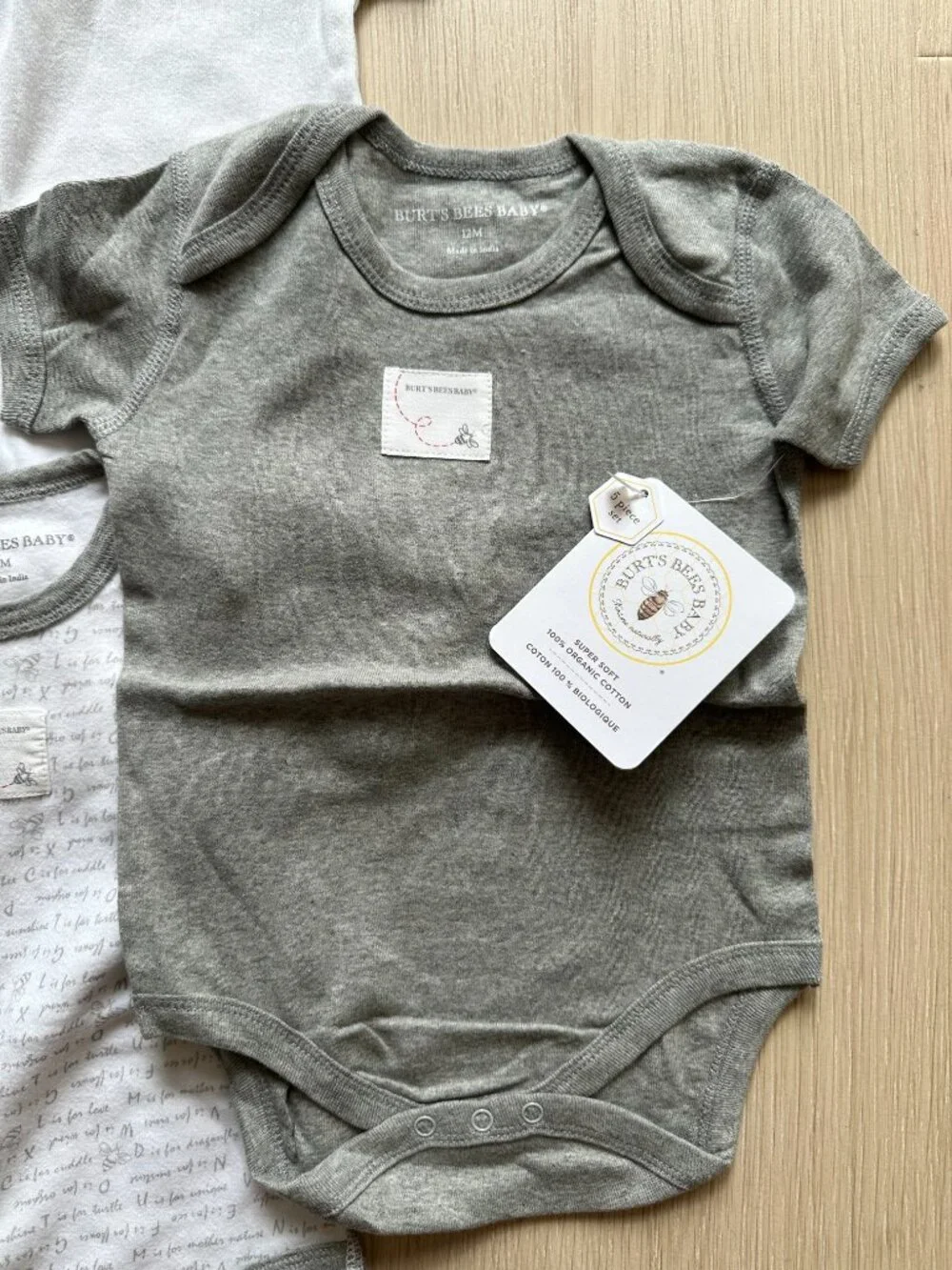 9 Piece Set of Baby Onesies 12M